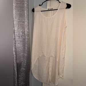 Sleeveless high low top